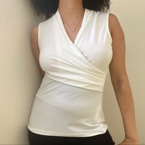 DKNY white sleeveless surplice blouse